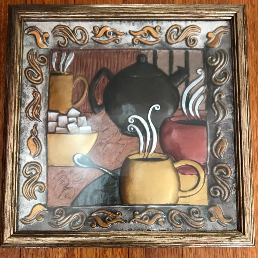 Framed picture of teapot and cups